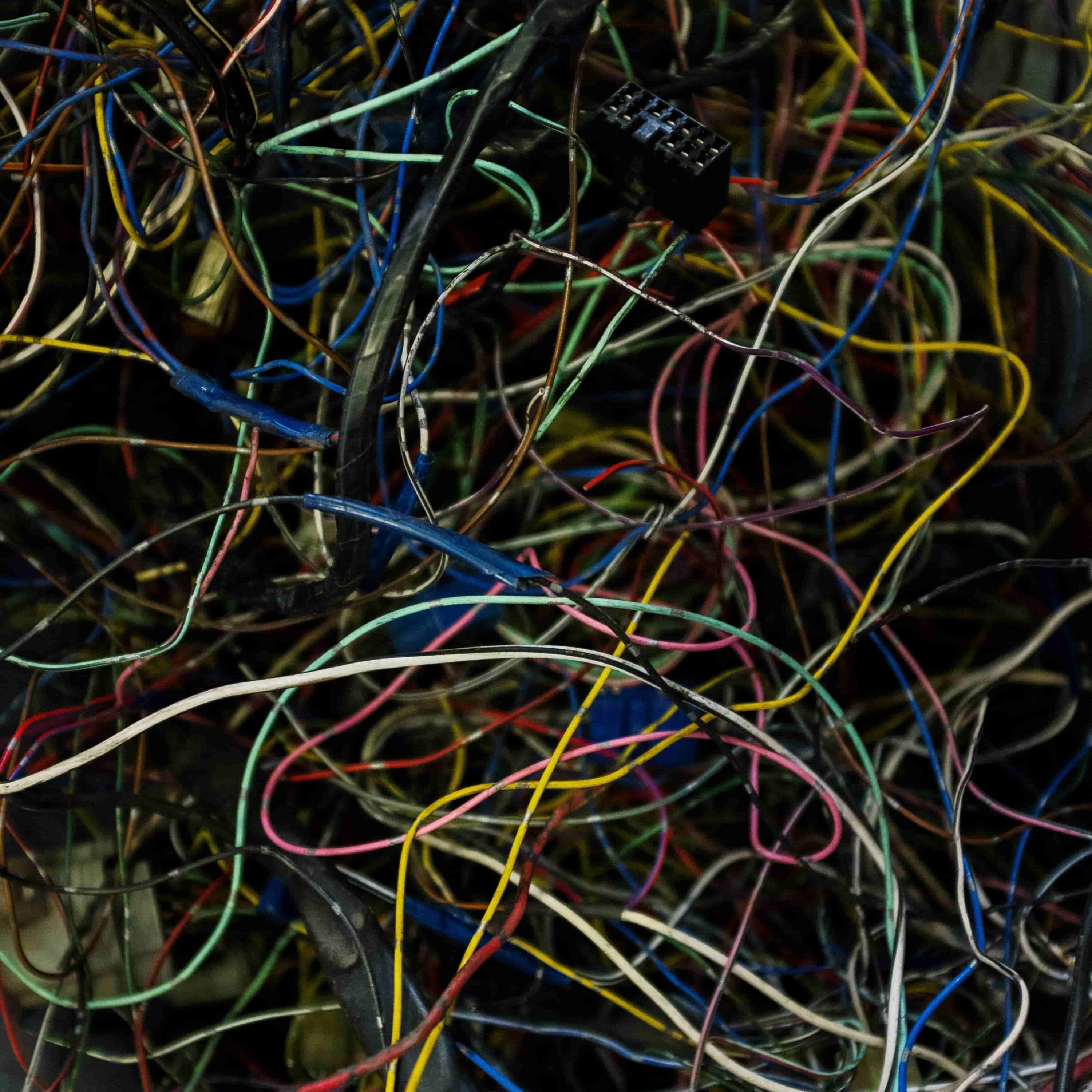 A jumble of overlapping electrical wires