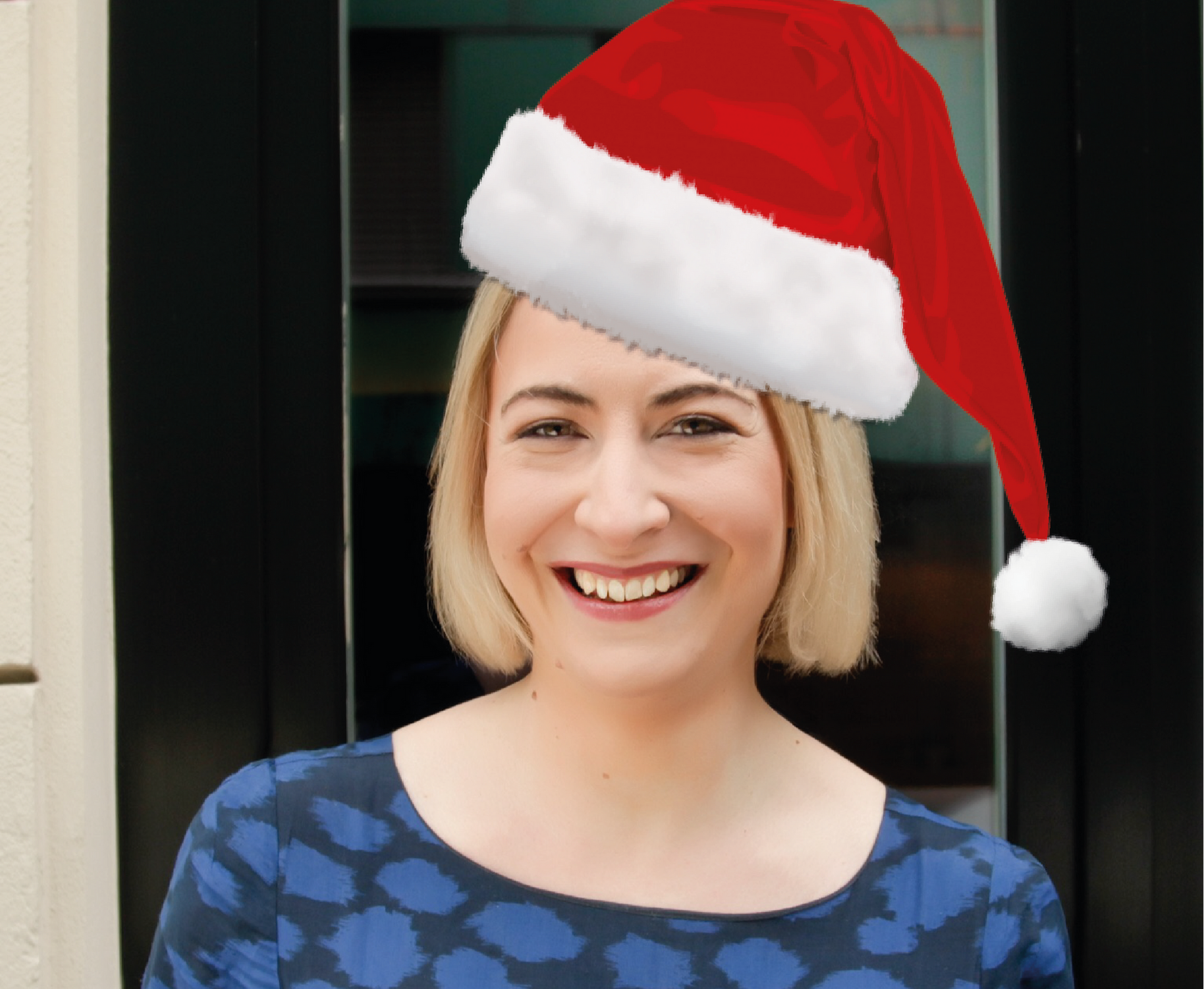 Jack & Grace team member Rebecca, with a Father Christmas hat on