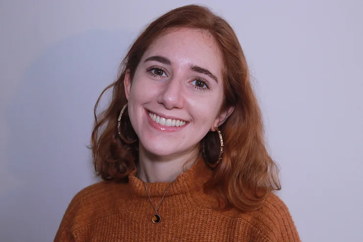 London-based journalist Kate Sammy smiles to the camera